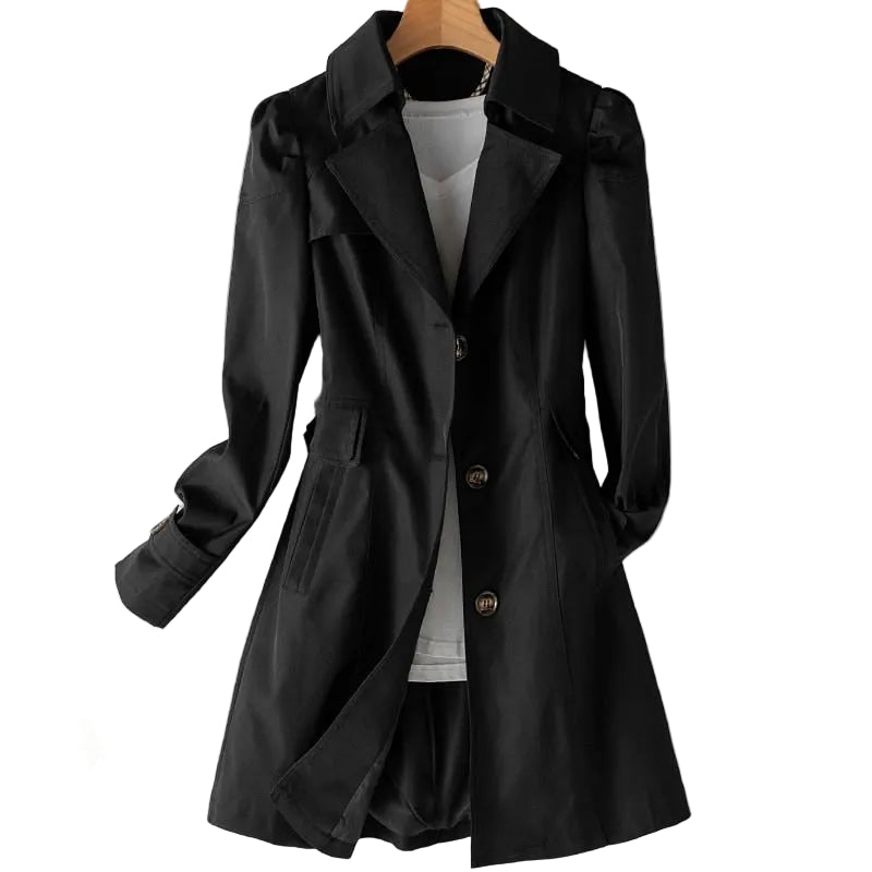 Black trench coat on a hanger with a white background