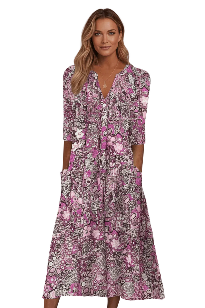 Woman wearing a floral dress on a white background