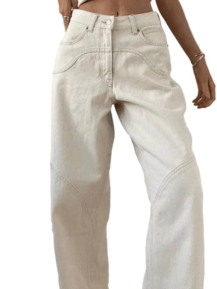 Beige jeans worn by a person against a white background
