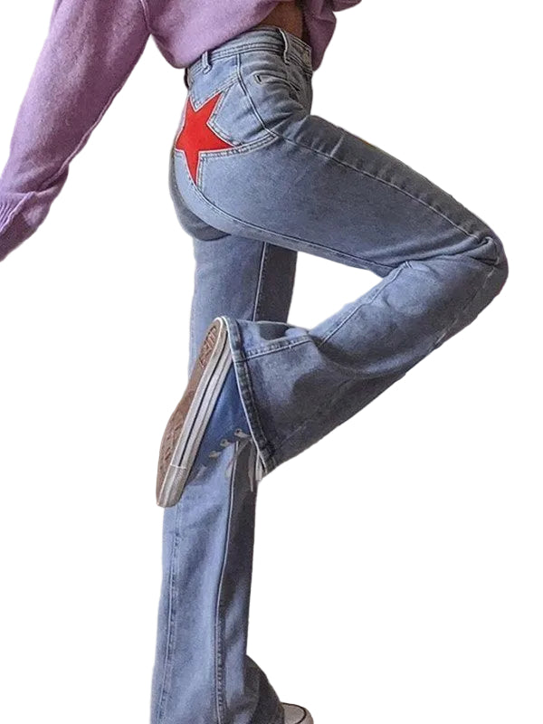 Person wearing light blue jeans with a red star patch.